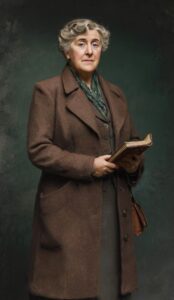 Famous directive novelist Agatha Christie wears a long coat,hand hold a book 
Discover this beautiful realistic portrait of a wise older woman featuring soft wavy silver hair, intelligent blue eyes, and a graceful expression. Dressed in a warm textured brown herringbone overcoat paired with a subtle green scarf, she gently holds a vintage leather book while carrying a small leather handbag. The dramatic dark background and professional lighting highlight her dignified presence, making this AI-generated image perfect for themes of timeless elegance, mature beauty, classic literature characters, and sophisticated vintage style.