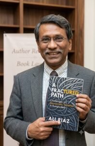 Professor Ali riaz hold his new book" a fractured path 
a democratic transition in Bangladesh"